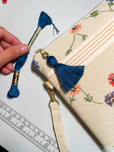 Flora - embroidered linen clutch bag