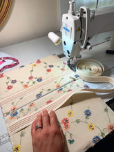 Flora - embroidered linen clutch bag